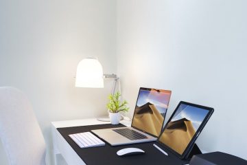 Photo of a Laptop and a Tablet on the Table
